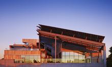 The west end of the building, which houses many of the collaborative and conference spaces, was designed to maximize views to the ocean and Ecological Reserve, with large overhangs shading the glass, taking advantage of the benign climate. - Photo Credit: © Nick Merrick