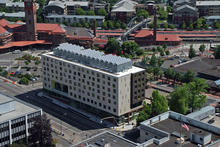Aerial view of Bud Clark Commons' onsite PV array. - Photo Credit: SkyShots