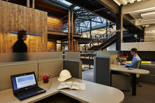 View of central atrium Commons from workstation. - Photo Credit: Benjamin Benschneider