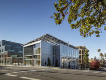 View from the intersection of Le Roy and Ridge Road: The building presents a new threshold to the campus that expresses the values of the Institute and the University. - Photo Credit: Tim Griffith